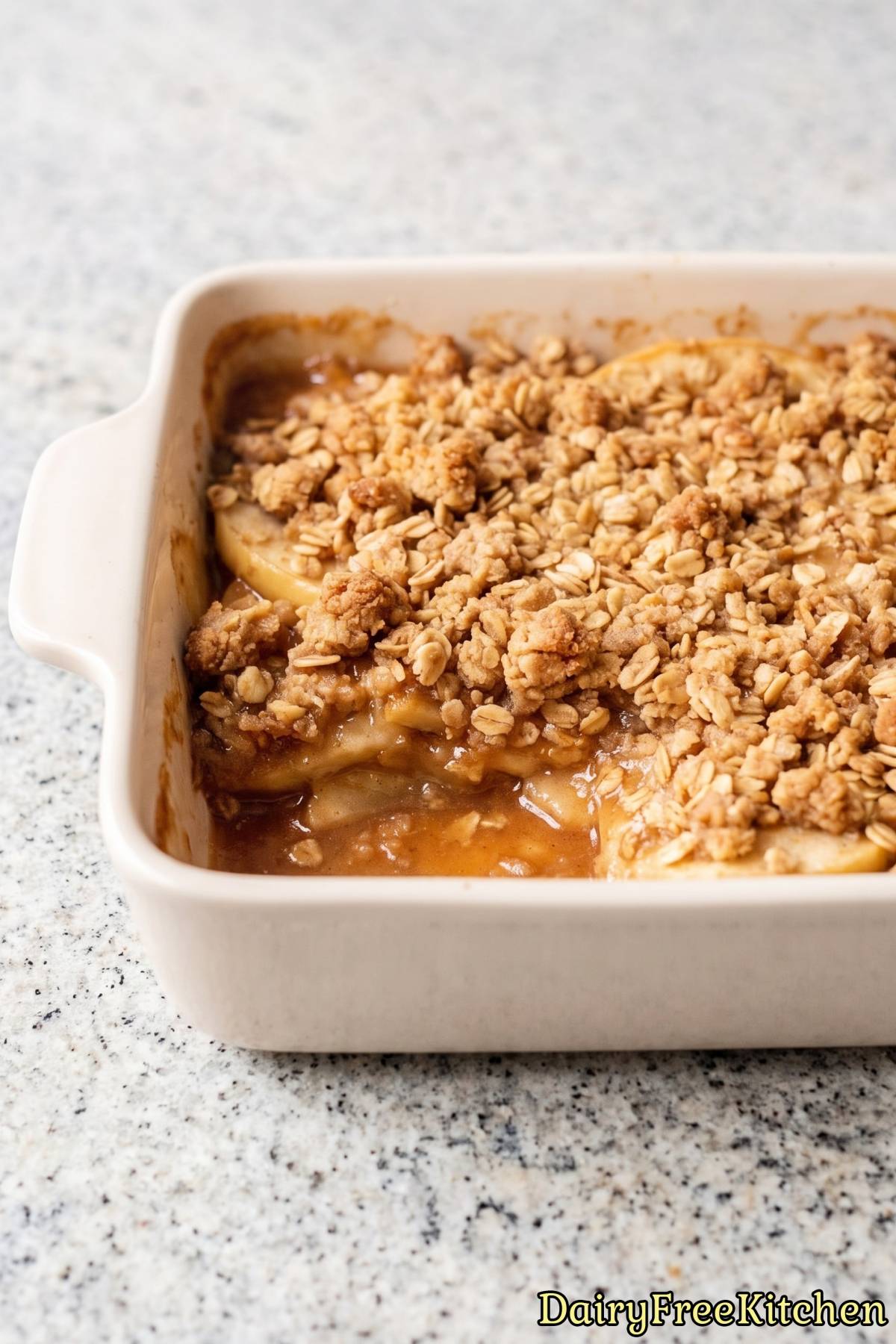 Warm dairy free apple crisp with oat topping.