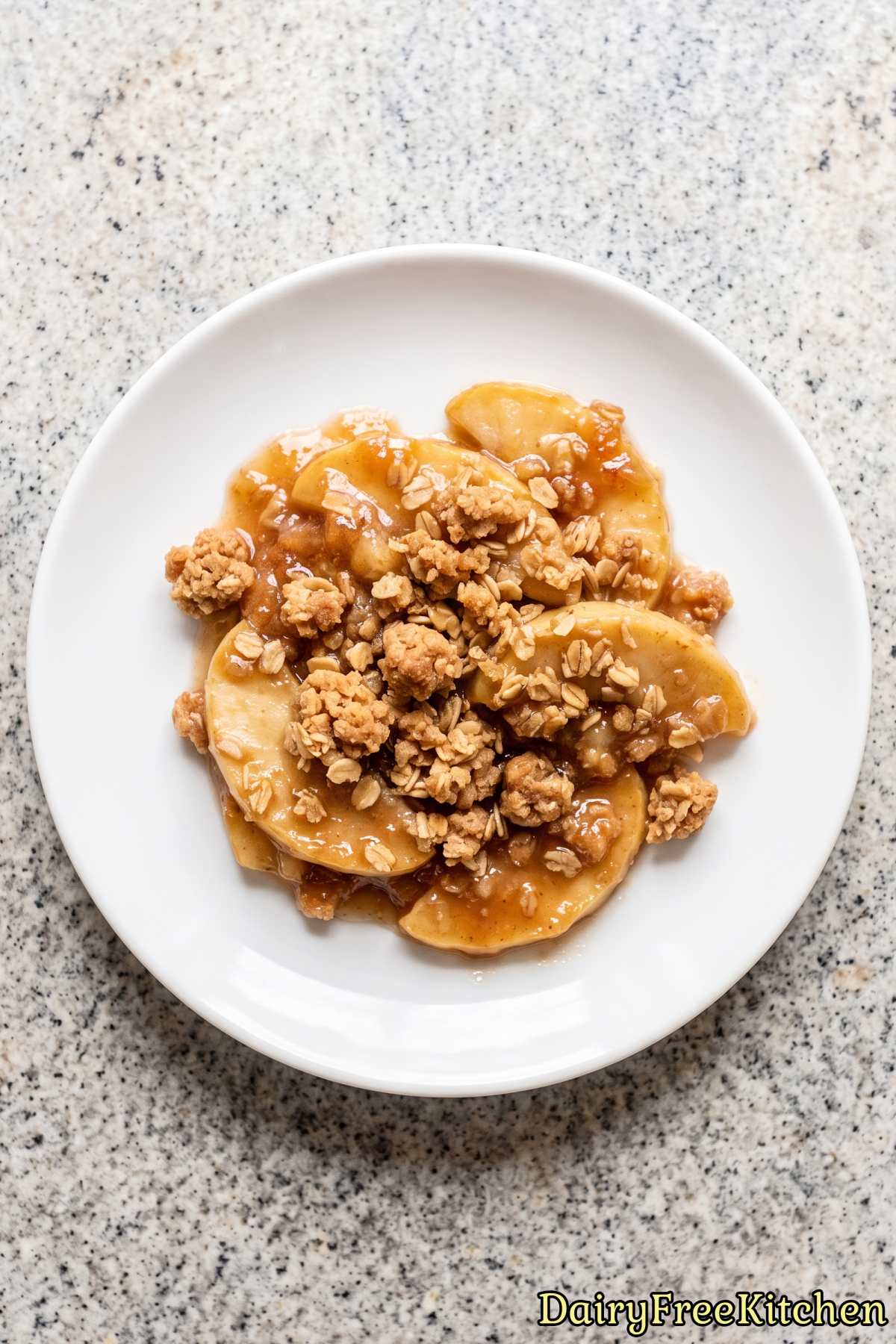 Rustic dairy free apple crisp with tender apples.