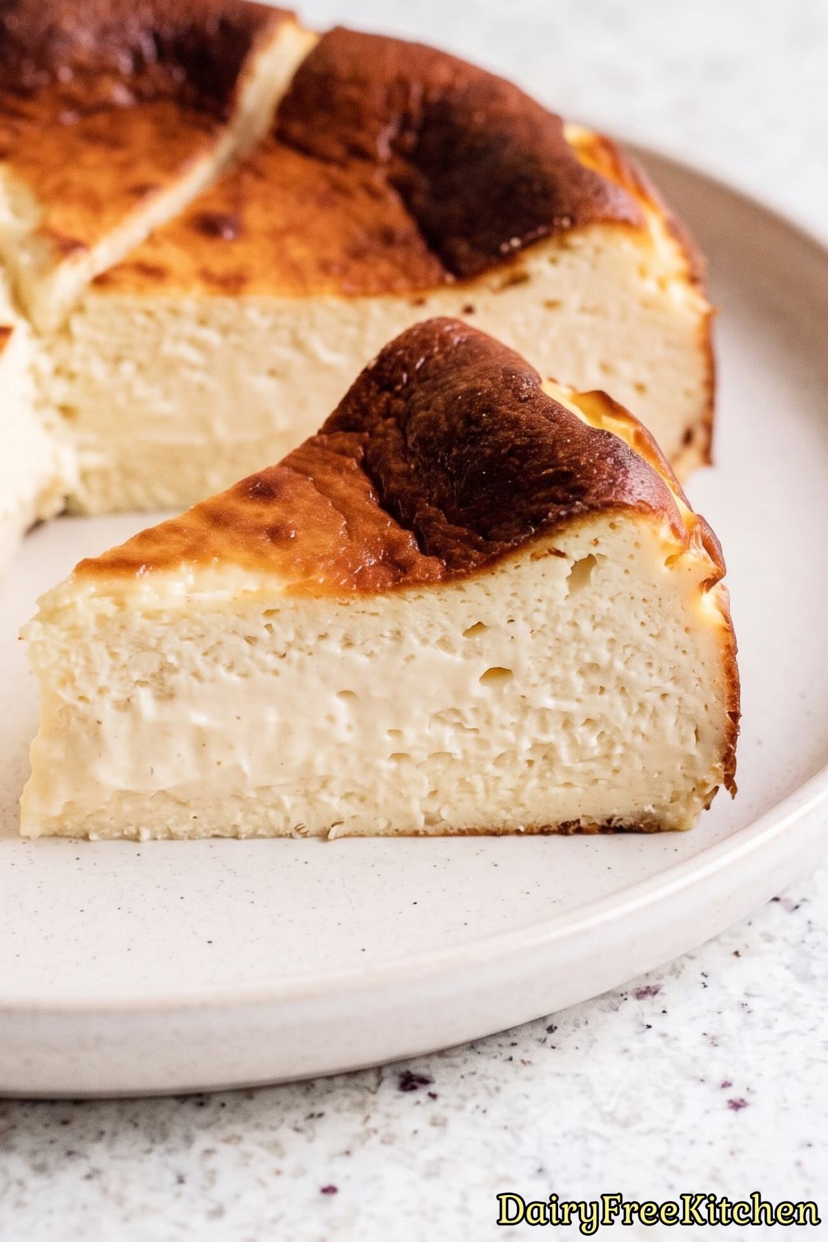 Rich dairy free Basque cheesecake slice