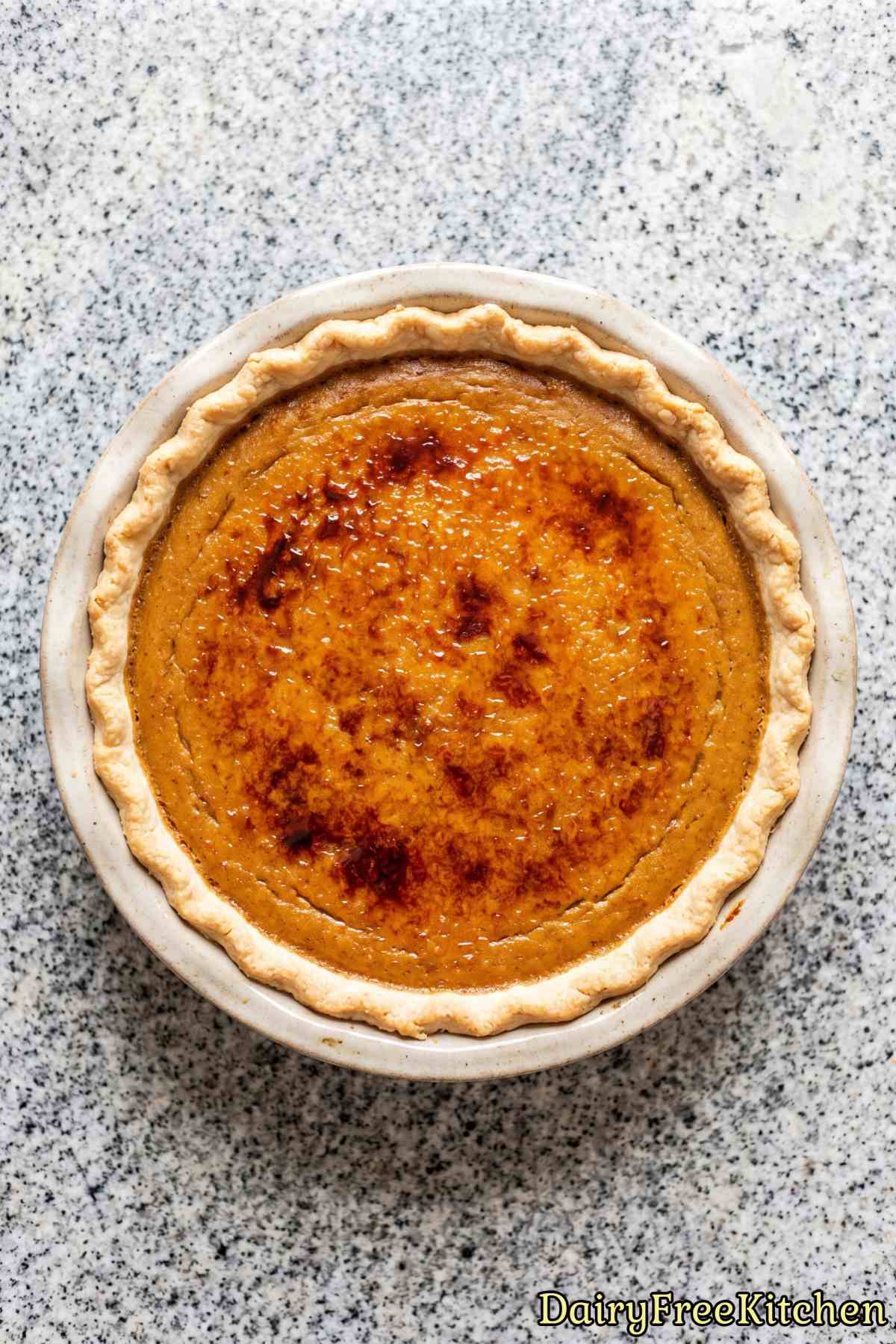 Smooth dairy free pumpkin pie with brulee top