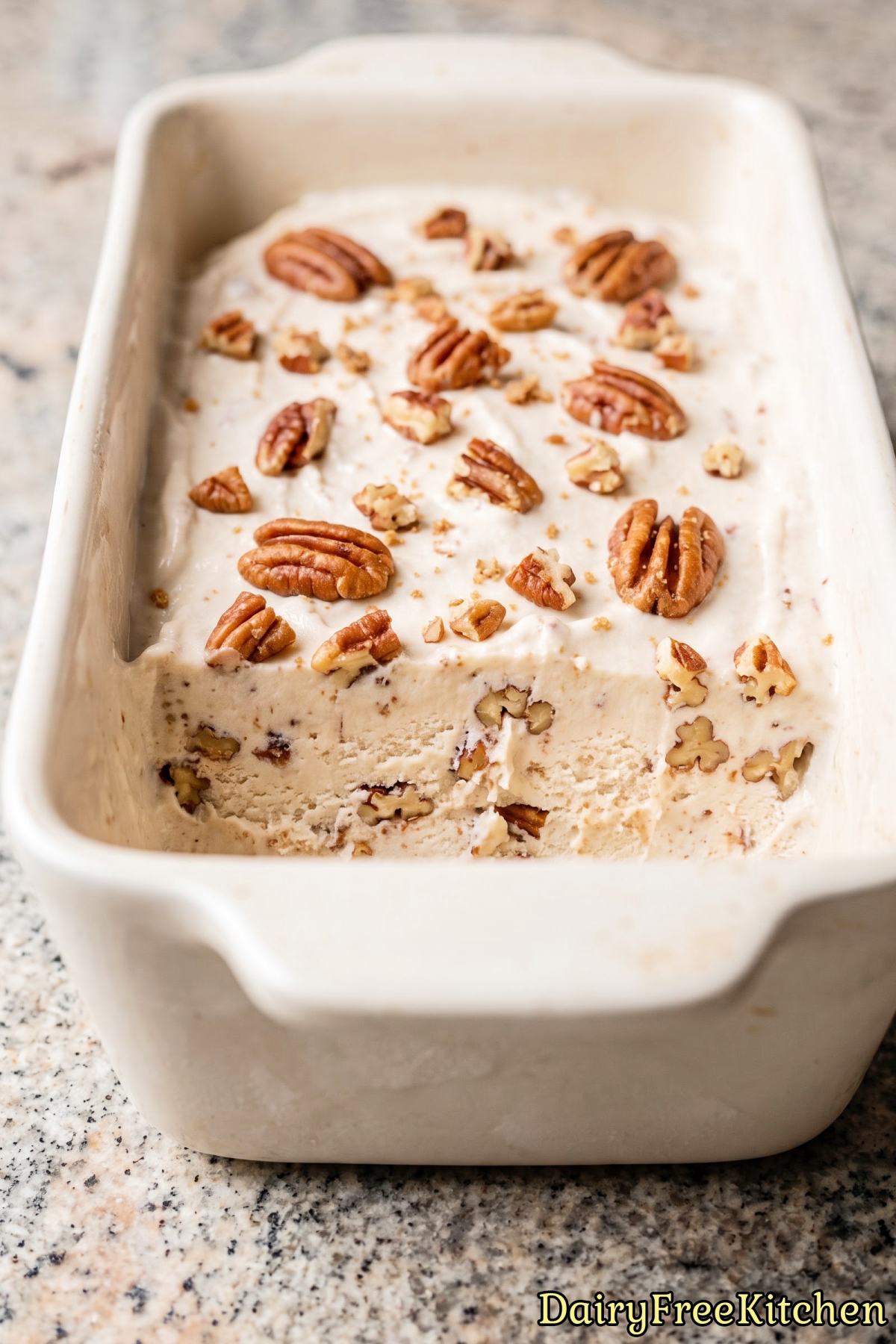 Scoop of dairy free butter pecan ice cream.