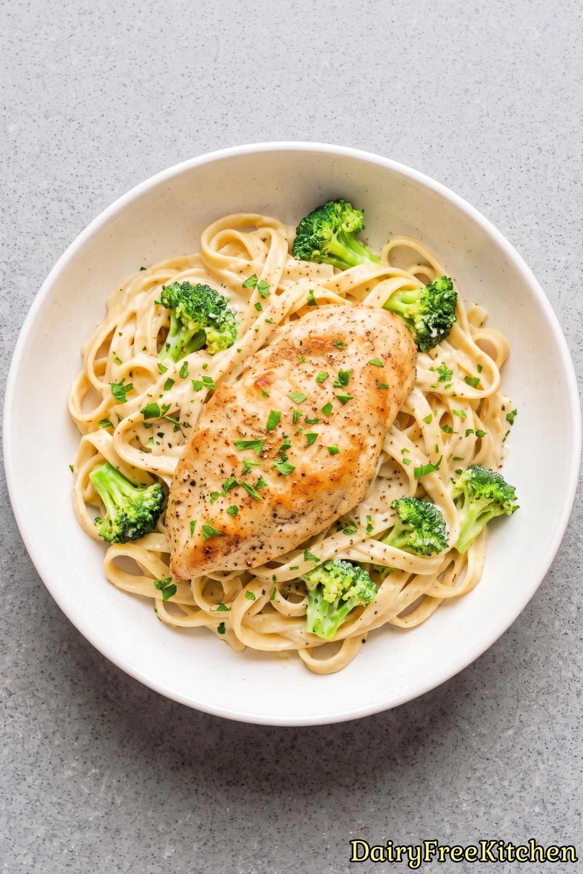 Bowl of dairy free chicken broccoli alfredo