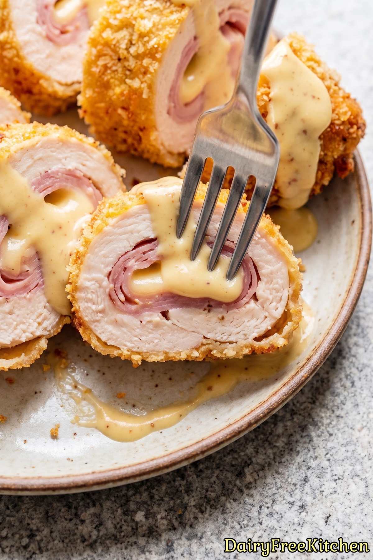 Sliced crispy dairy free chicken cordon bleu