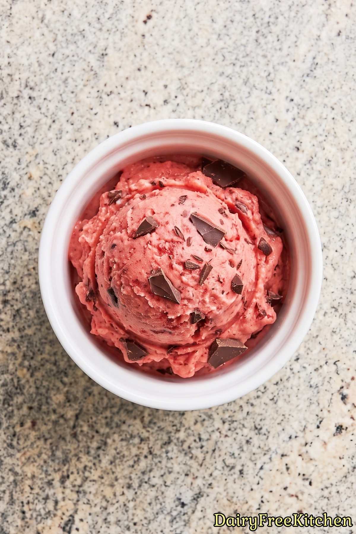 Scoop of dairy free strawberry ice cream
