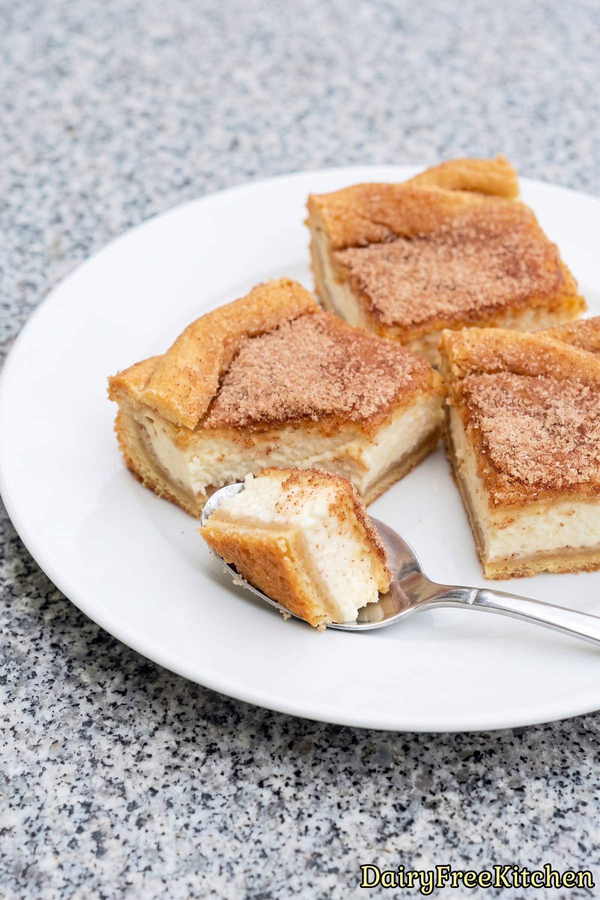 Golden churro cheesecake bars