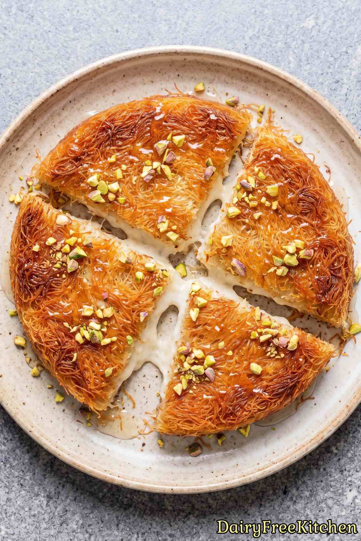 Slice of rich dairy free cream kunafa