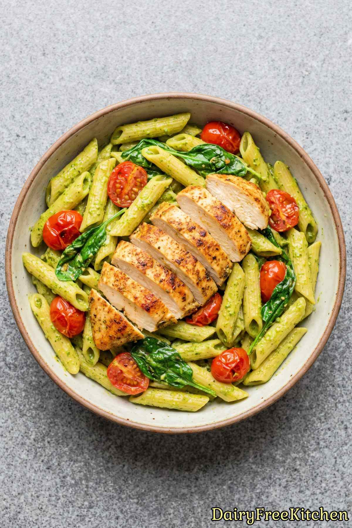 Tender chicken in creamy dairy free pesto pasta