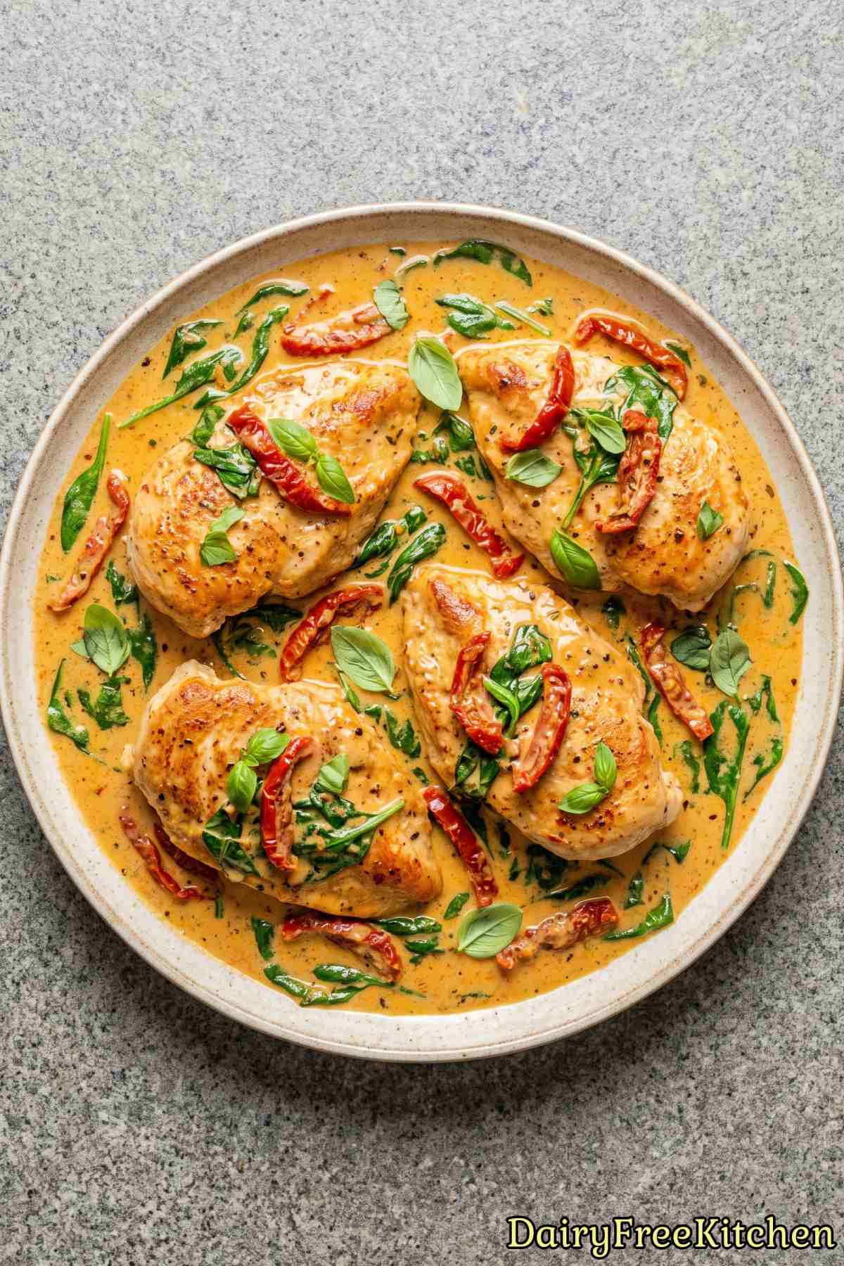 Tender Tuscan chicken in rich dairy free sauce