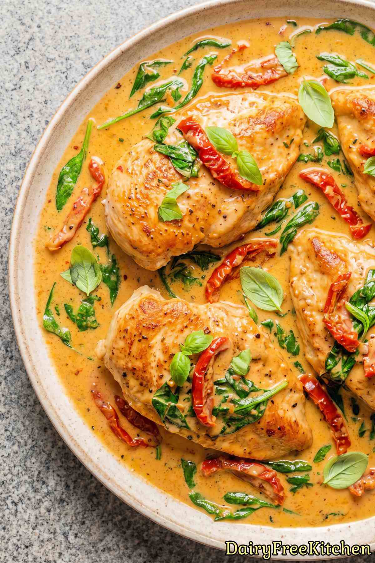 Creamy dairy free Tuscan chicken in a skillet