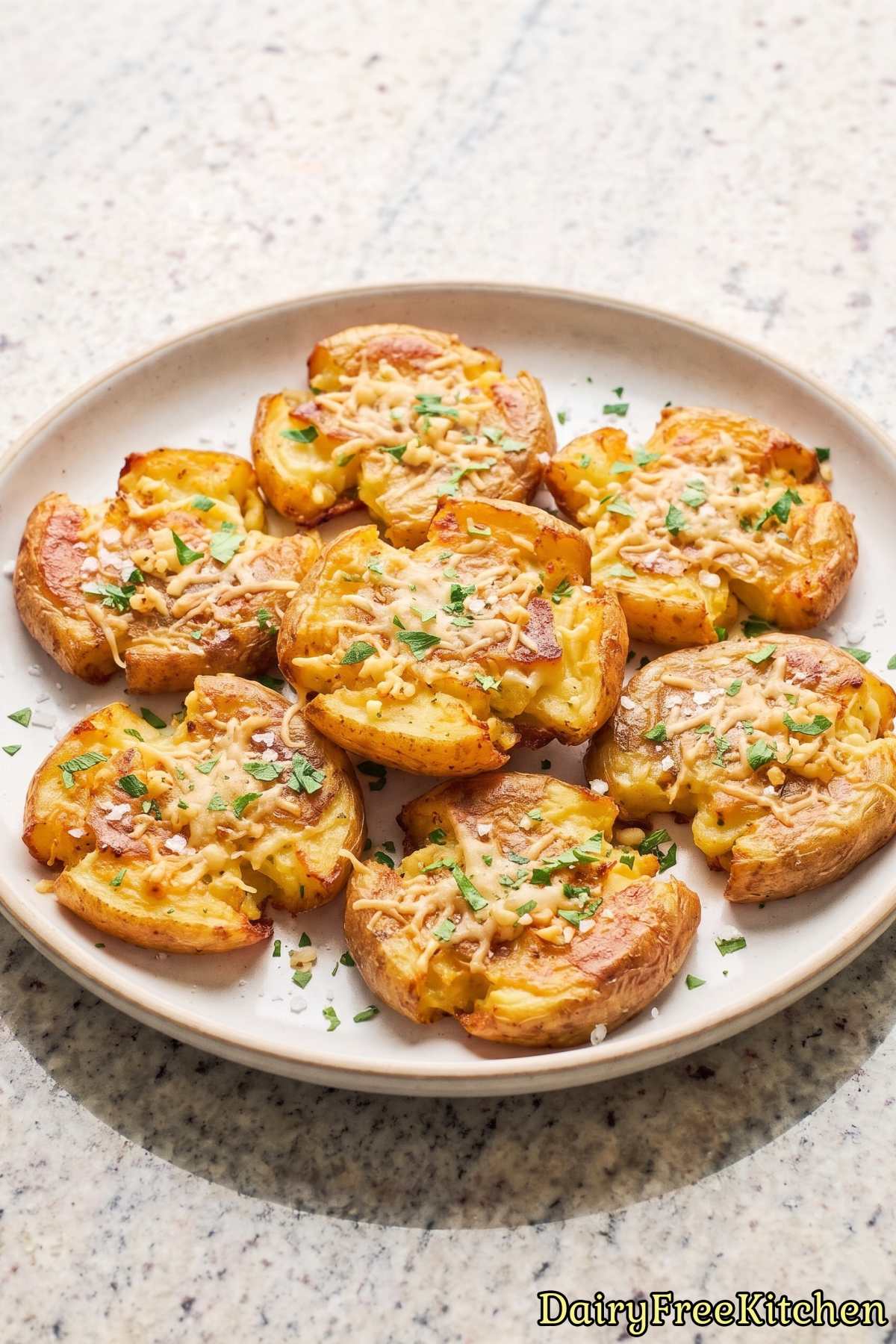 Rustic smashed potatoes with dairy free cheese