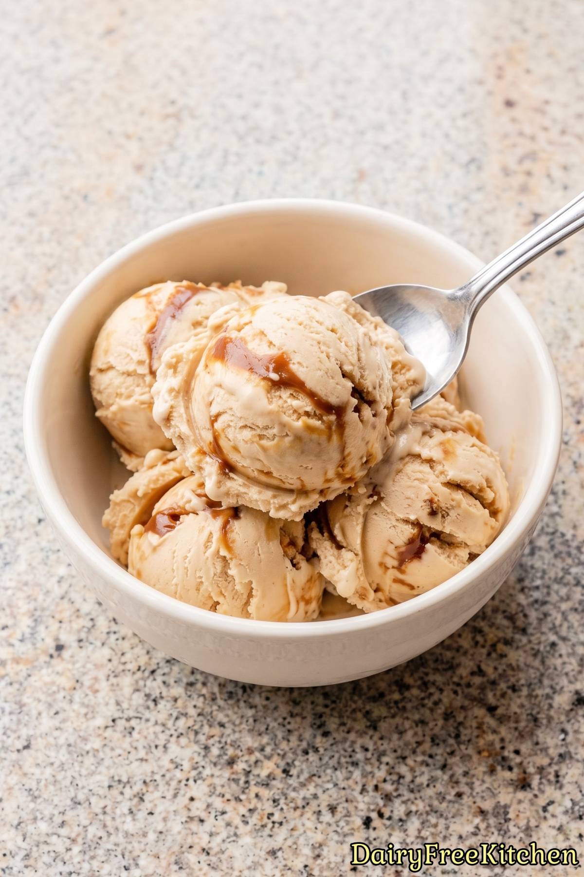 Dairy free dulce de leche ice cream scoop