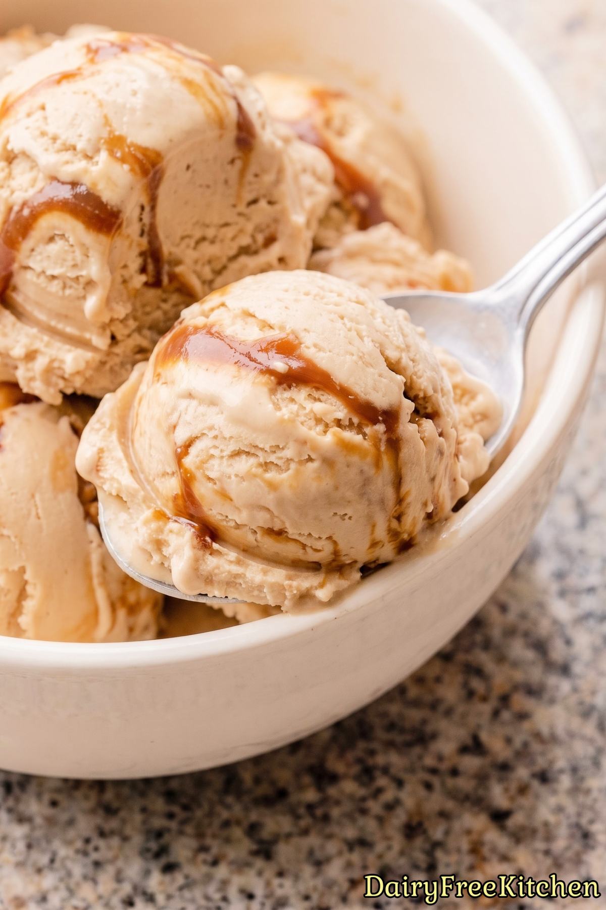 Creamy vegan dulce de leche ice cream in bowl