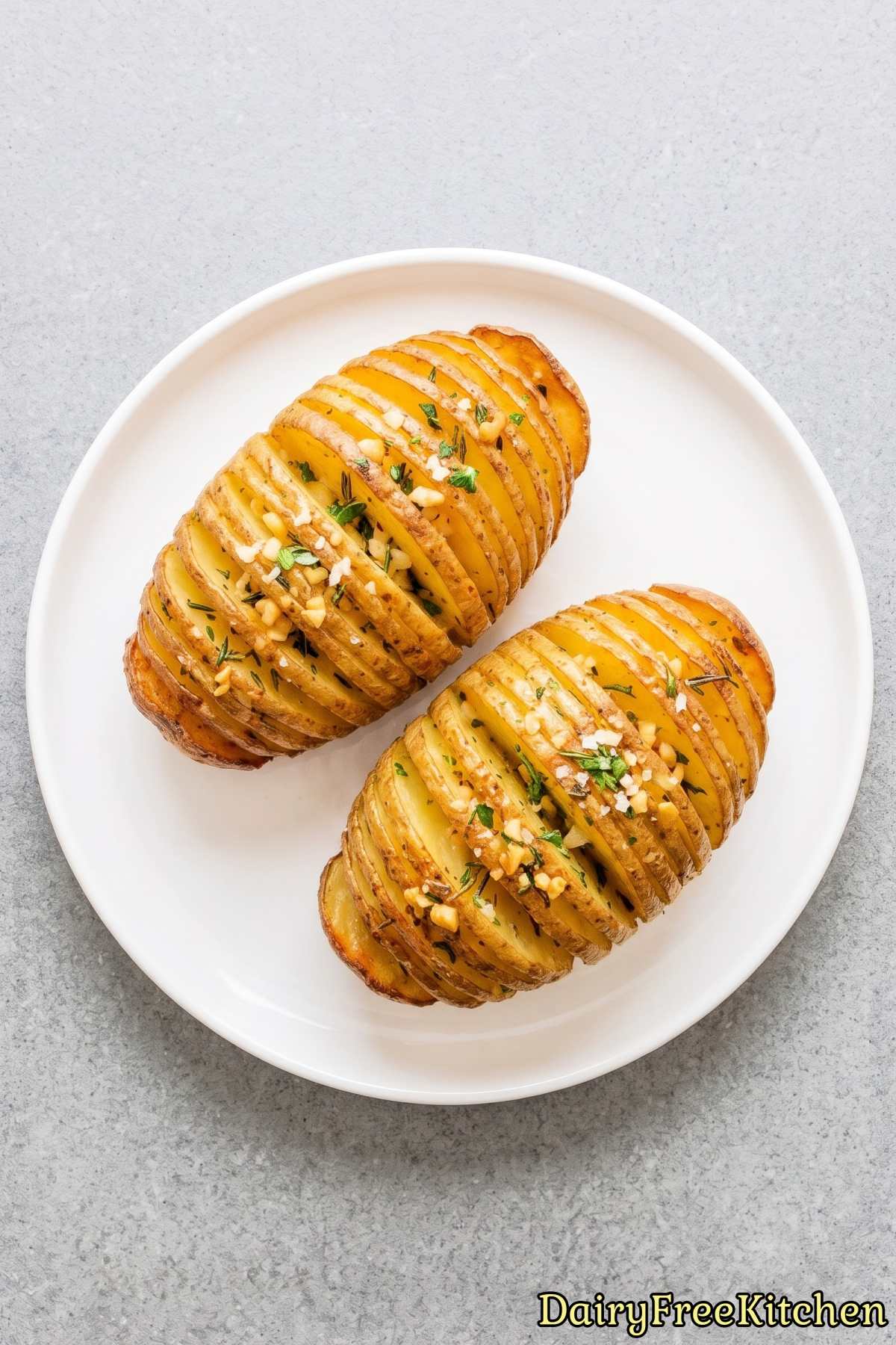 Golden baked garlic herb hasselback potatoes