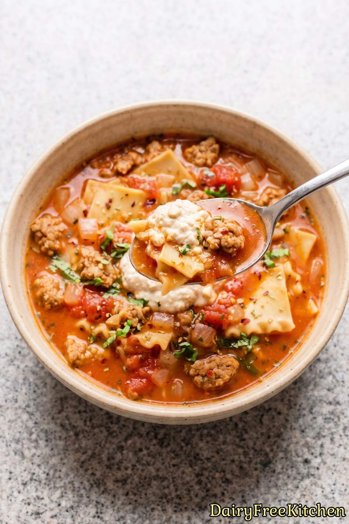 Bowl of warm, creamy dairy-free lasagna soup