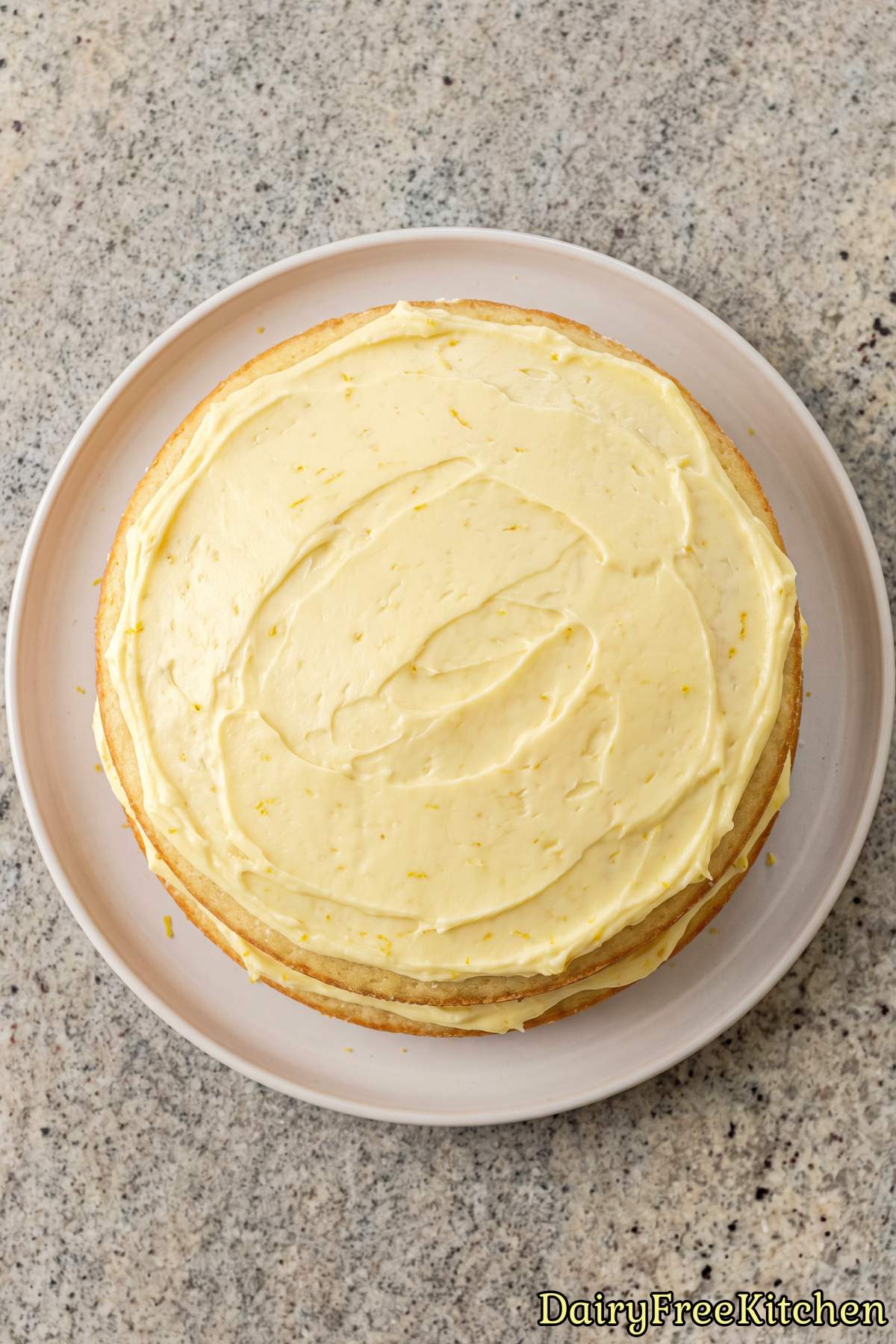 Slice of dairy free lemon layer cake