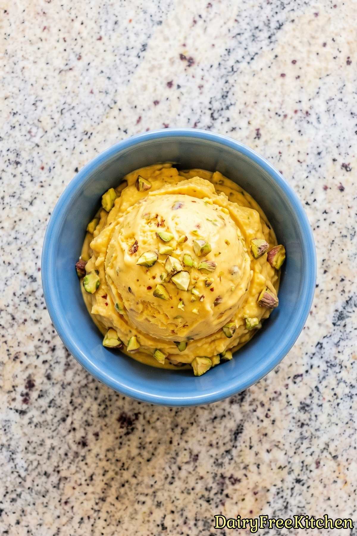 Dairy free mango lassi ice cream scoop