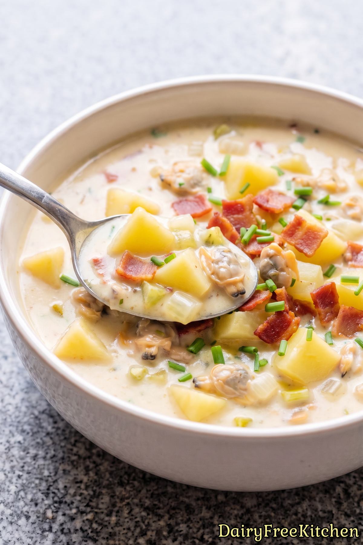 Bowl of hot dairy free clam chowder soup