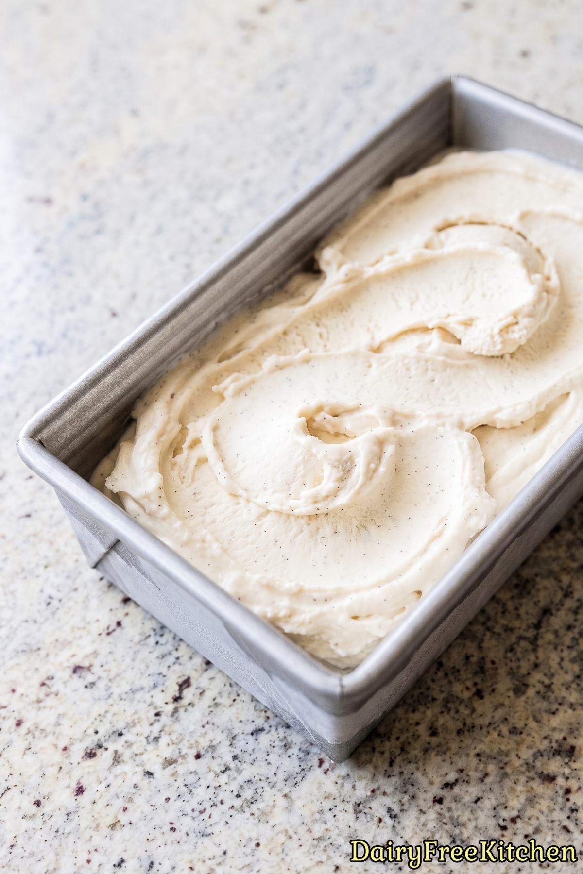 Bowl of easy dairy free vanilla bean ice cream.