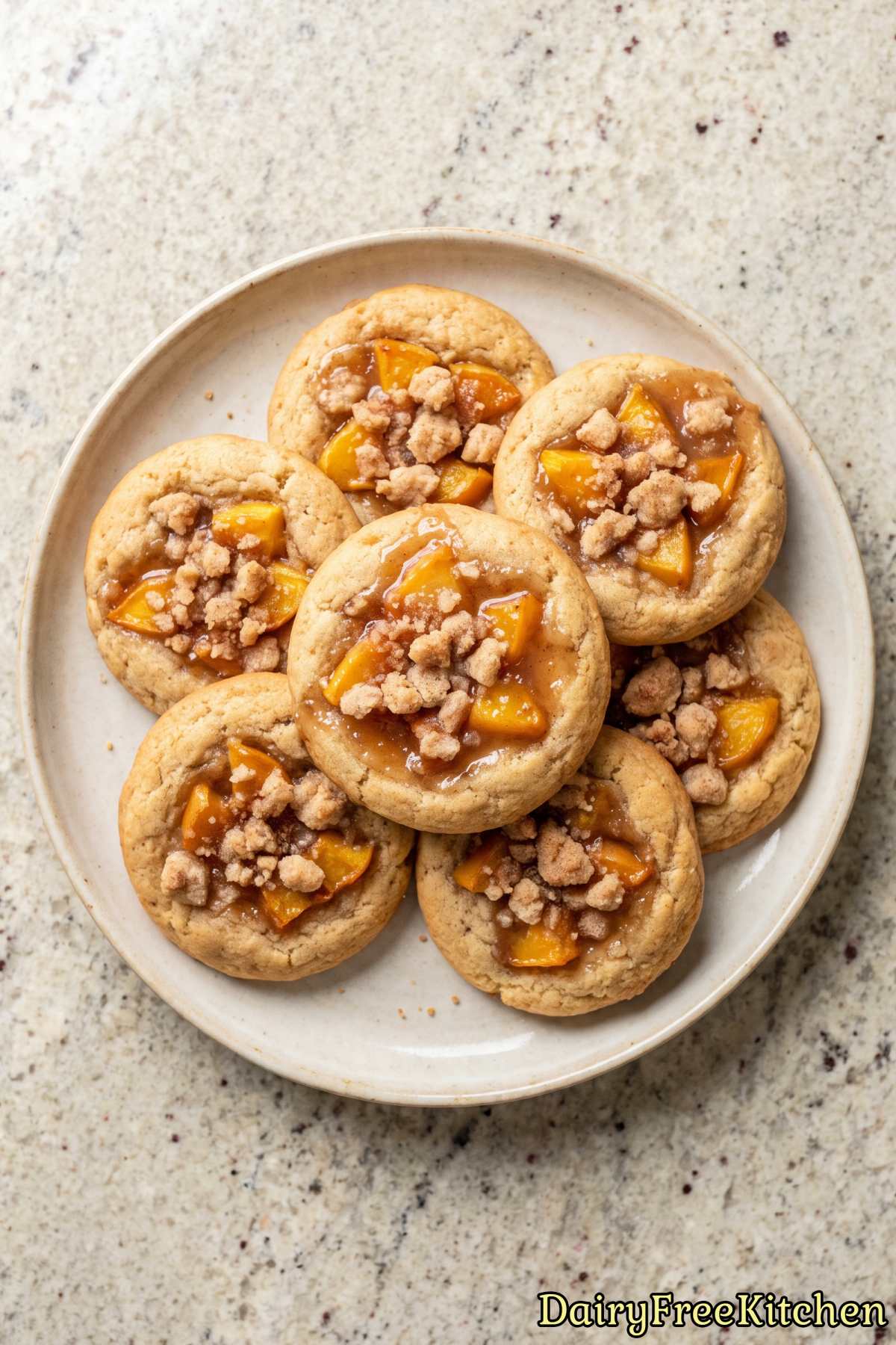 Warm peach cobbler cookies on a tray