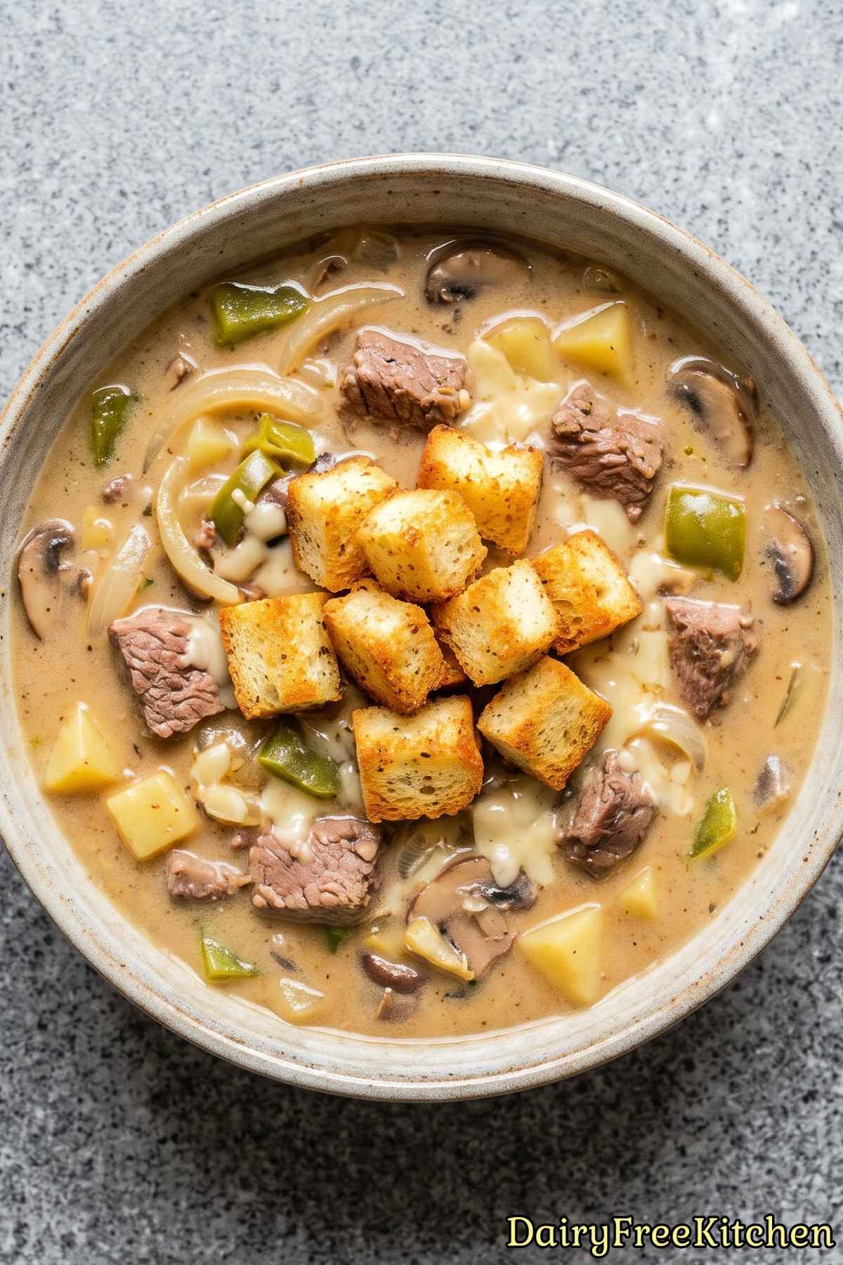 Rich and cozy dairy free cheesesteak soup