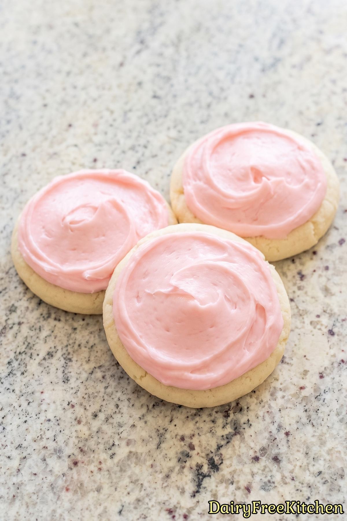 Soft dairy free sugar cookies with pink icing