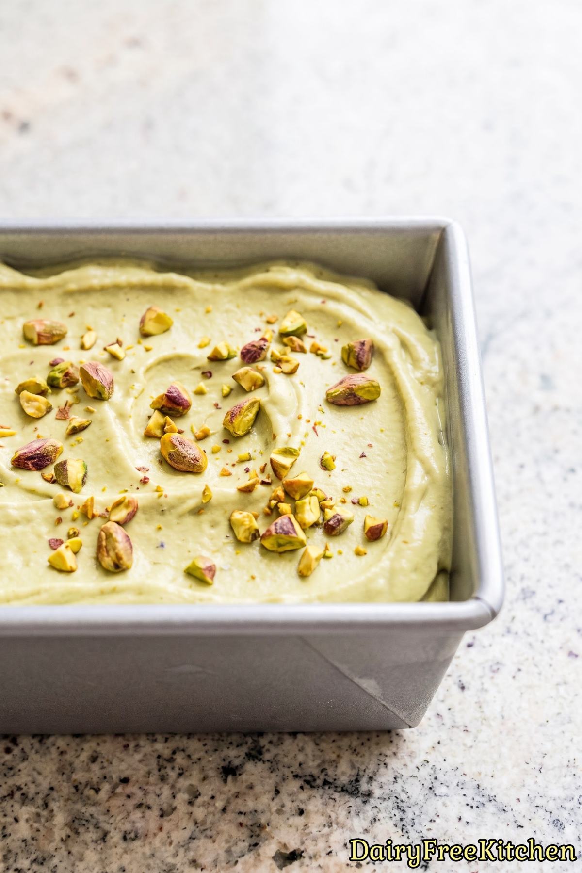 Creamy dairy free pistachio ice cream scoop
