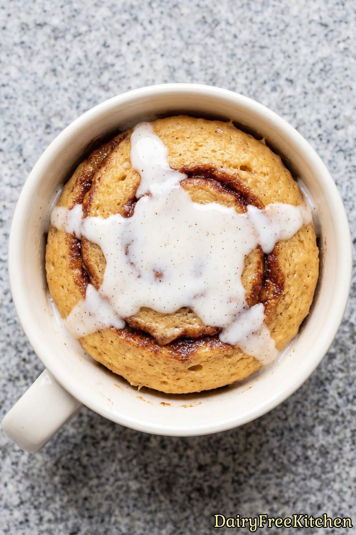 Warm protein cinnamon roll in a mug
