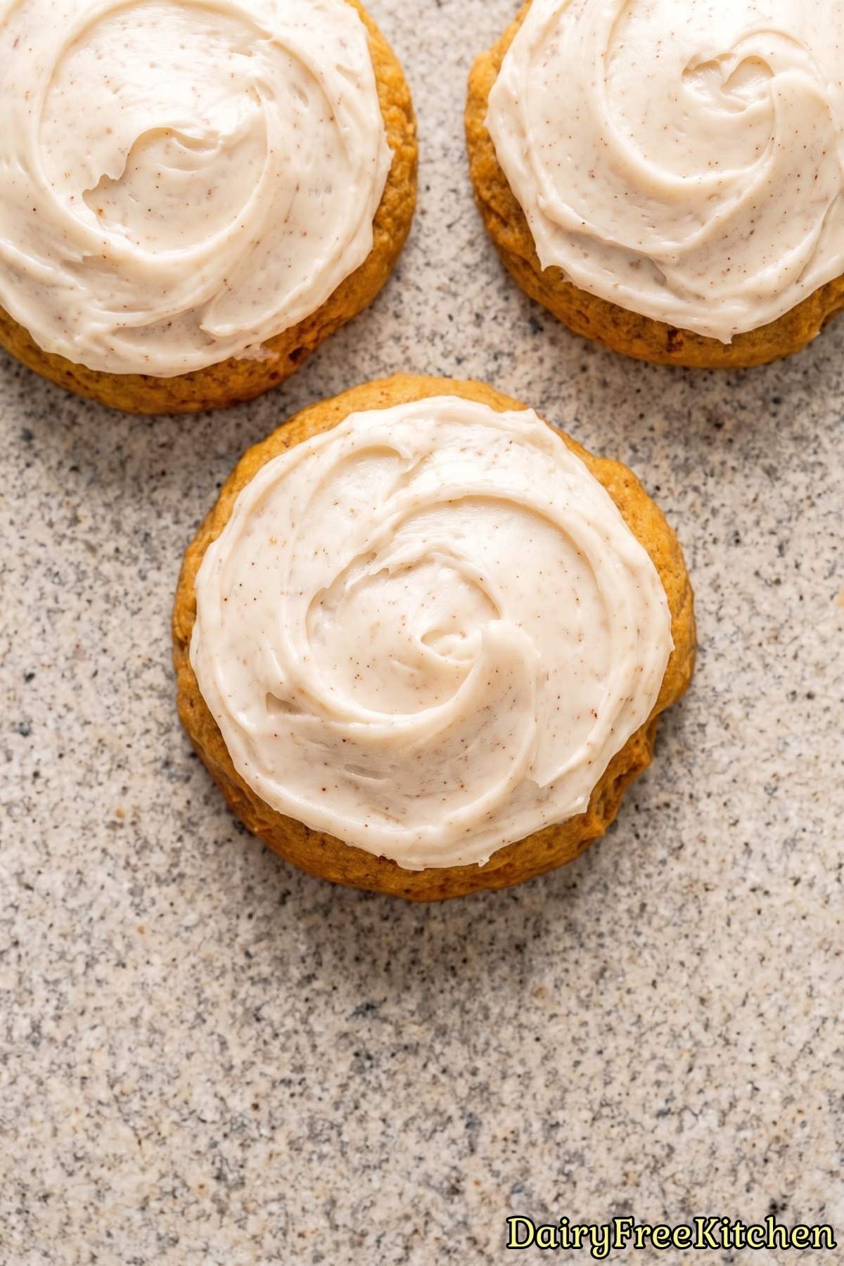 Soft dairy free pumpkin cookies with frosting