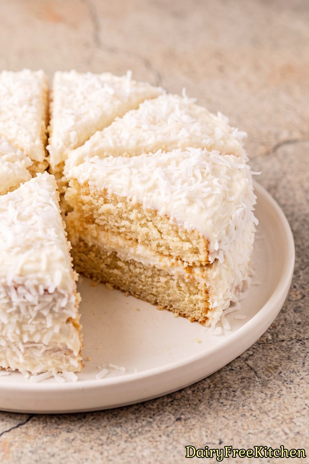 Frosted dairy free Southern coconut cake