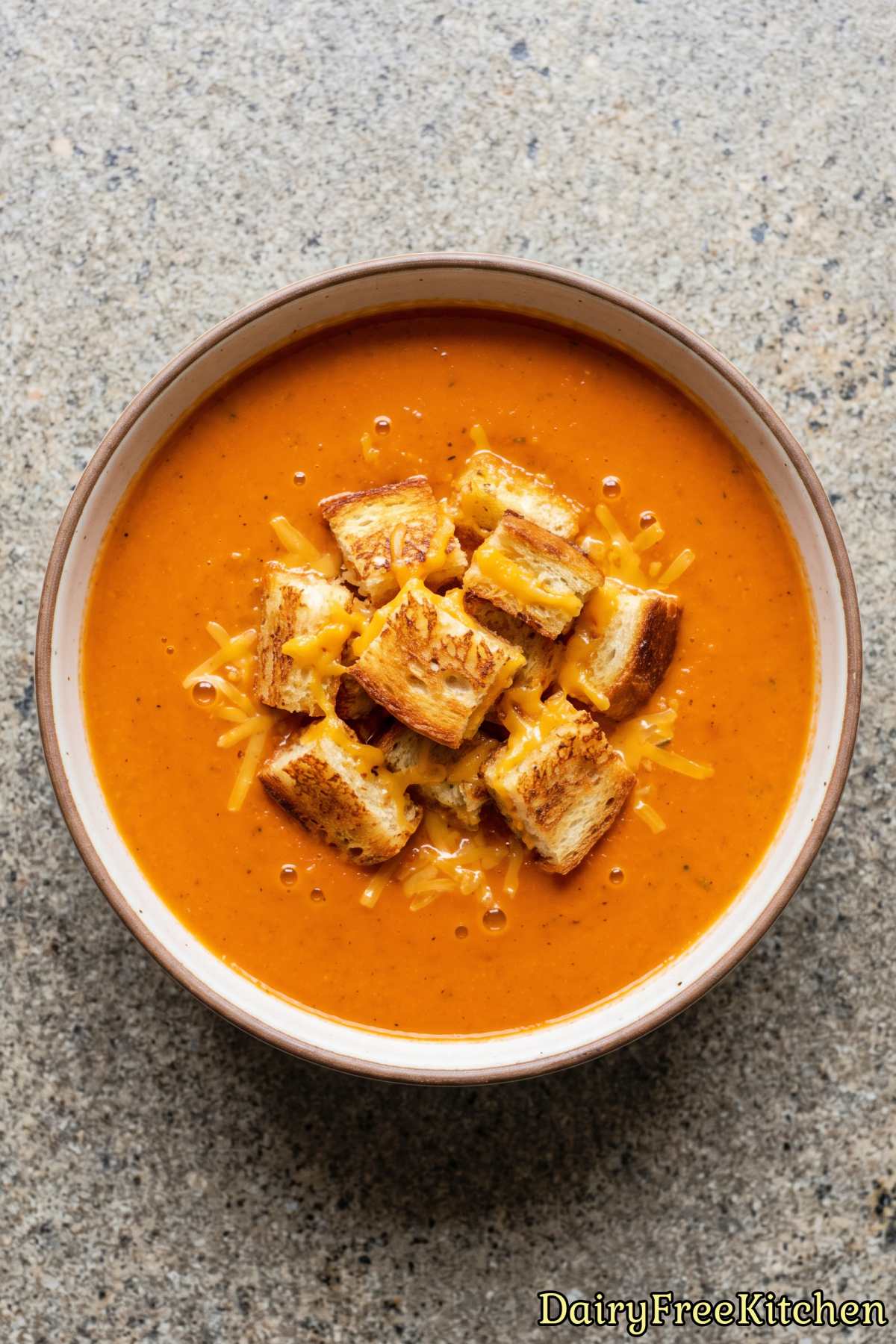 Hearty dairy free tomato soup with croutons