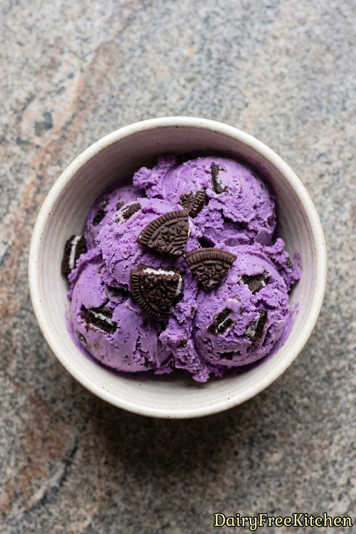 Scoop of sweet ube cookies and cream ice cream
