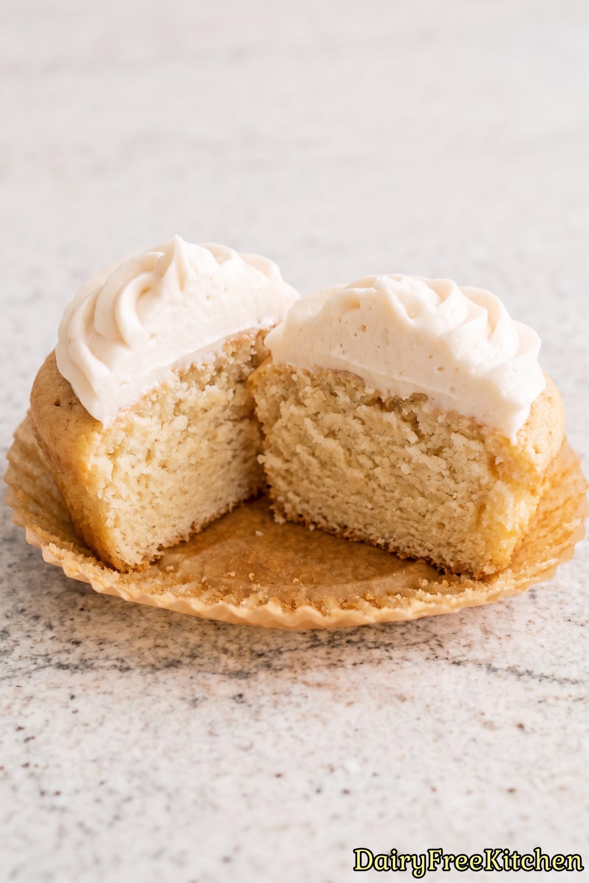 Fluffy dairy free vanilla cupcakes with frosting