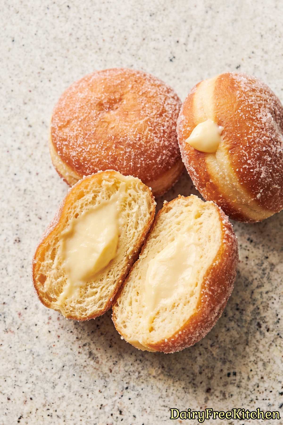Fluffy dairy free vanilla cream filled donuts